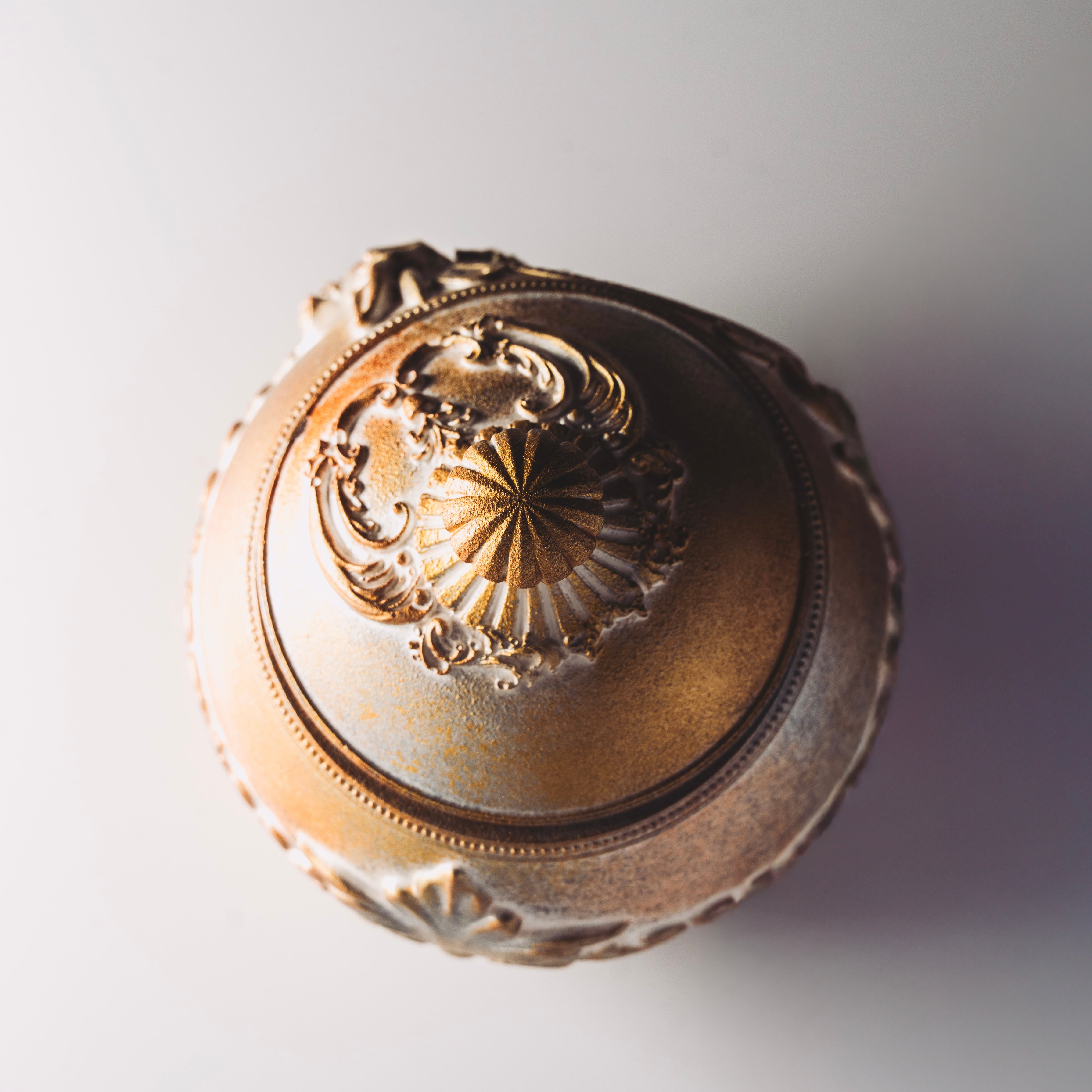 The Holiday Timekeeper Gold Ornament Candle