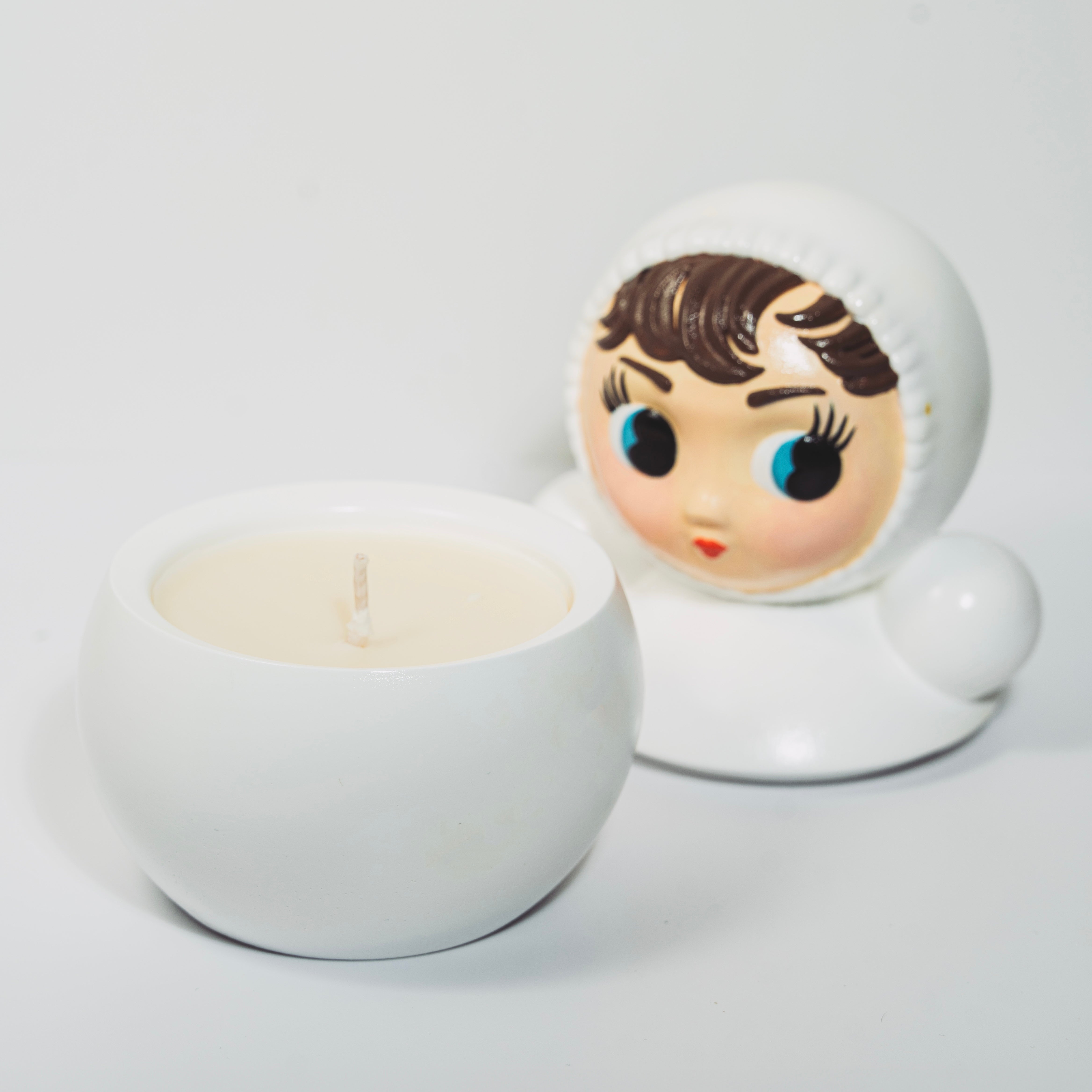 Unique gift candle inspired by vintage wobble dolls