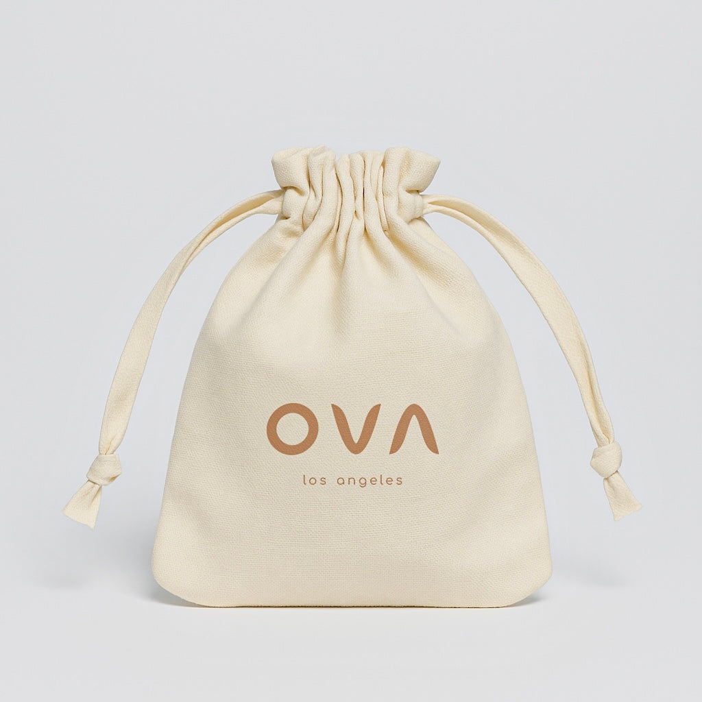 The Holiday Timekeeper Gold Ornament Candle