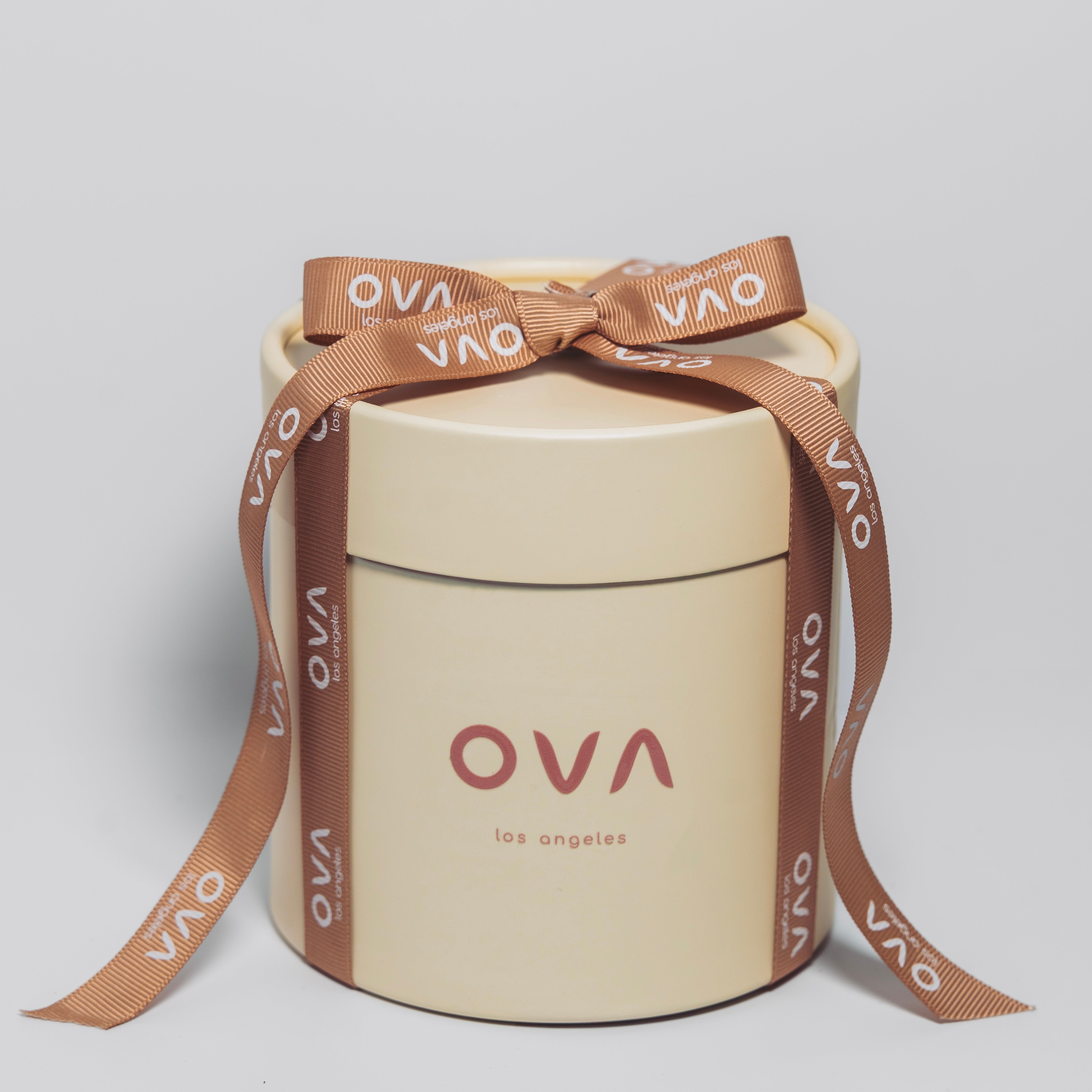 The Holiday Timekeeper Gold Ornament Candle